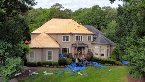 Old Roof Being removed, new roof being installed, cost of new roof